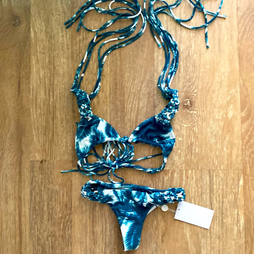 Mikoh extra small extra small two piece. Never worn with tags. Looks tiny.